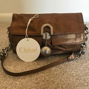 Brown leather clutch